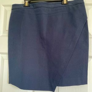 Navy blue Banana Republic faux wrap skirt. Size 12 petite